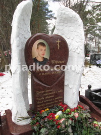 Фото памятника на кладбище. Высота установленного памятника - 180 см. Цена памятника - доступная.